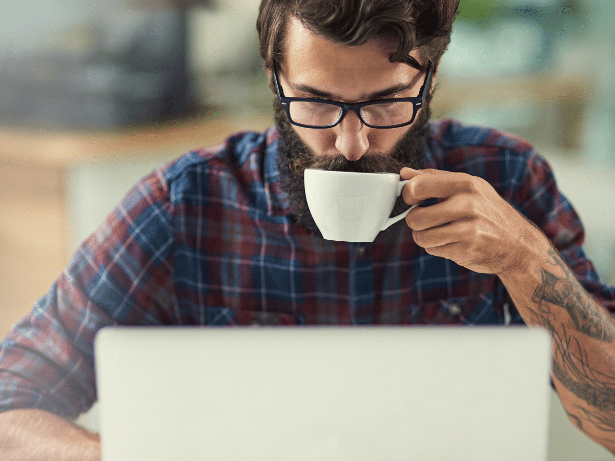 Man Sipping Coffee, Wordpress Development Services [Scaled]